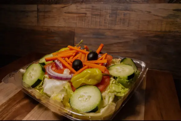 Fresh salad with cucumbers and carrots.